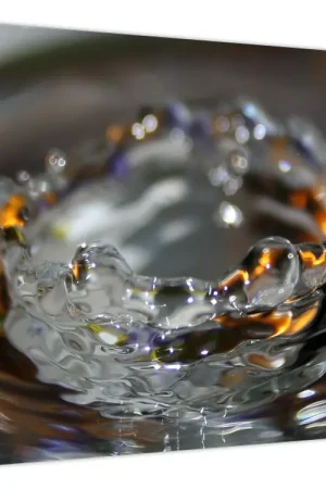 Tani Schilderij - Armbad van waterdruppels