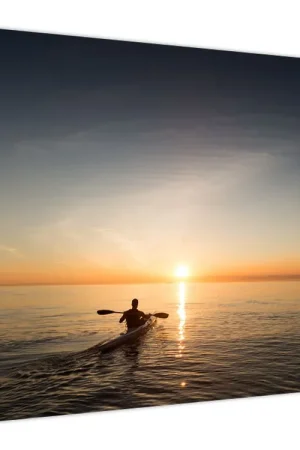 Tani Schilderij - Kanovaarder bij zonsondergang