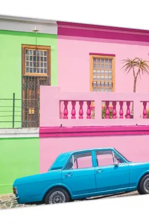 Zwrot pieniędzy Schilderij - Auto voor gekleurde huizen