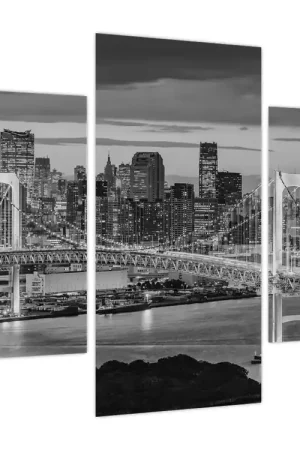 Schilderij - Grote stad met een rode toren Szybka dostawa