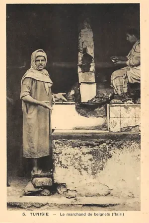 Tunesië 5. Tunisie Le marchand de beignets (ftairi) Afrika Klederdracht HC47645 Zamów teraz