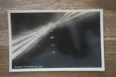 Bezpieczna płatność Ameland Vuurtoren bij nacht